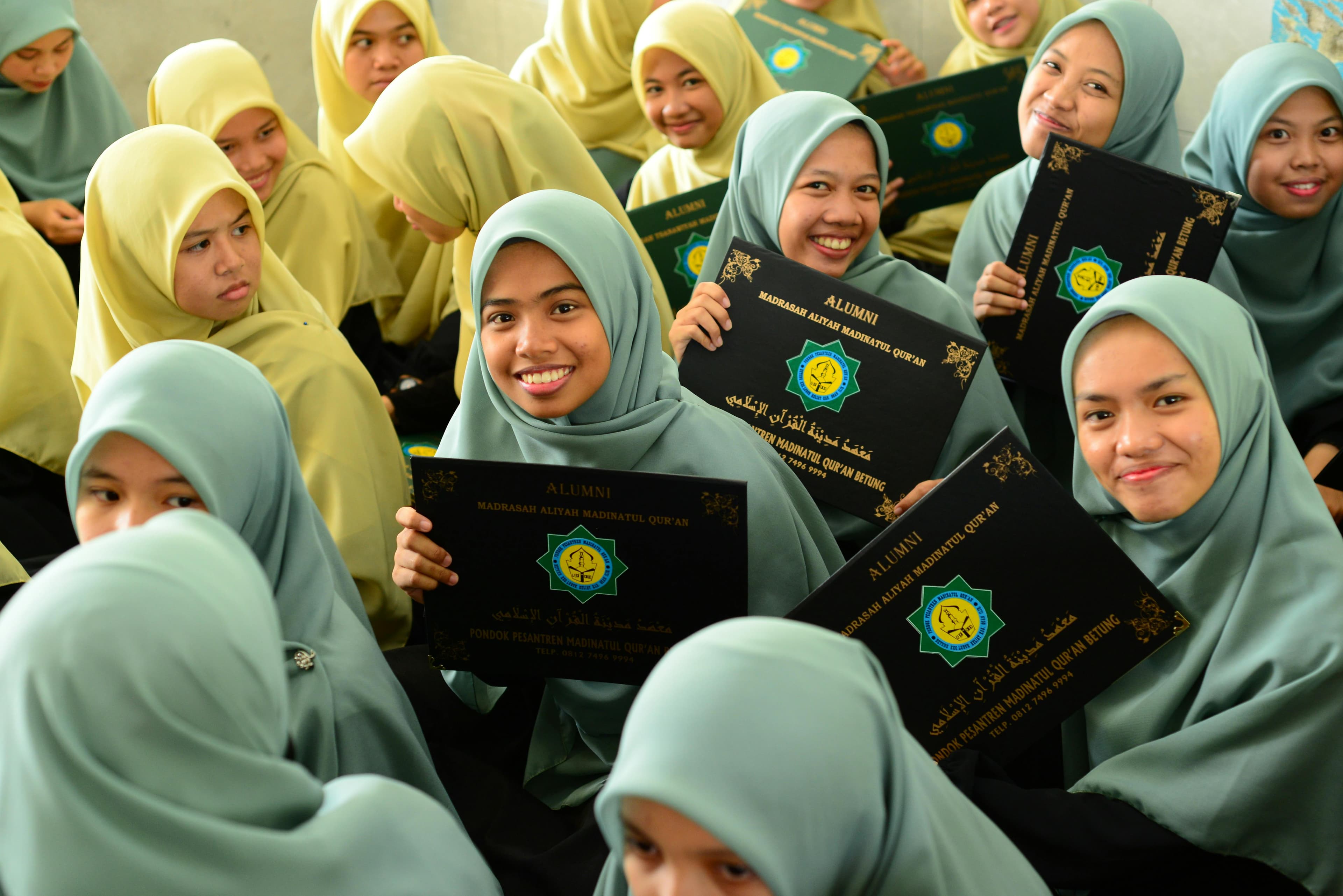 Holy Quran with prayer beads - passing knowledge to future generations
